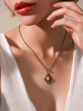 Vintage 1928 Gold Tone Pink Cabochon Pendant Necklace